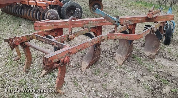 image for item DQ0375 McCormick  four bottom plow