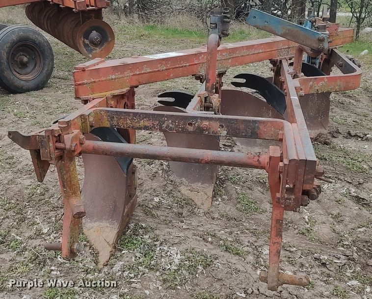 image for item DQ0375 McCormick  four bottom plow