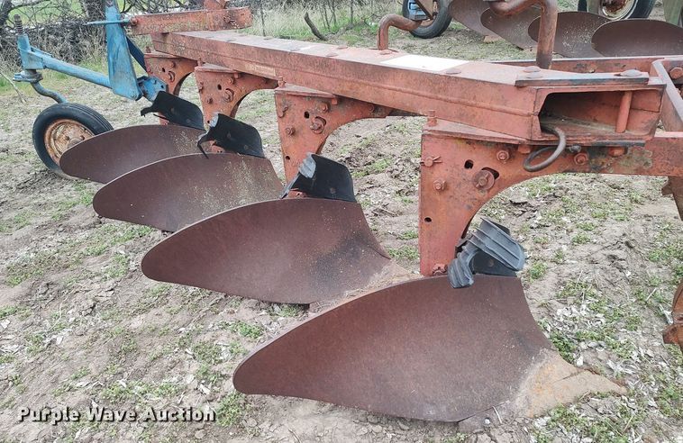 image for item DQ0375 McCormick  four bottom plow