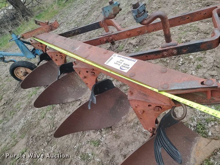 image for item DQ0375 McCormick  four bottom plow