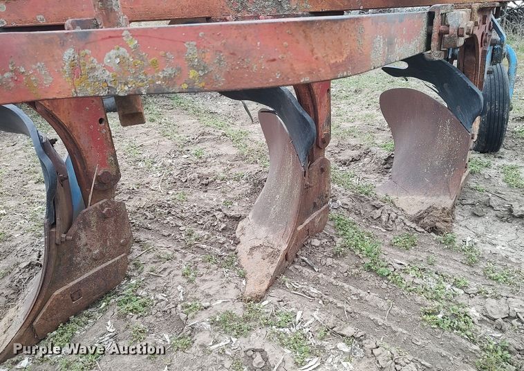 image for item DQ0375 McCormick  four bottom plow