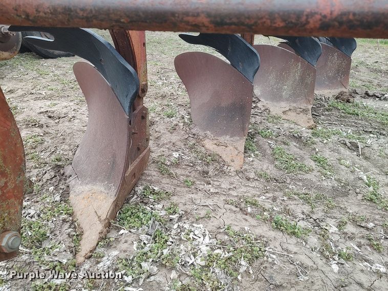 image for item DQ0375 McCormick  four bottom plow