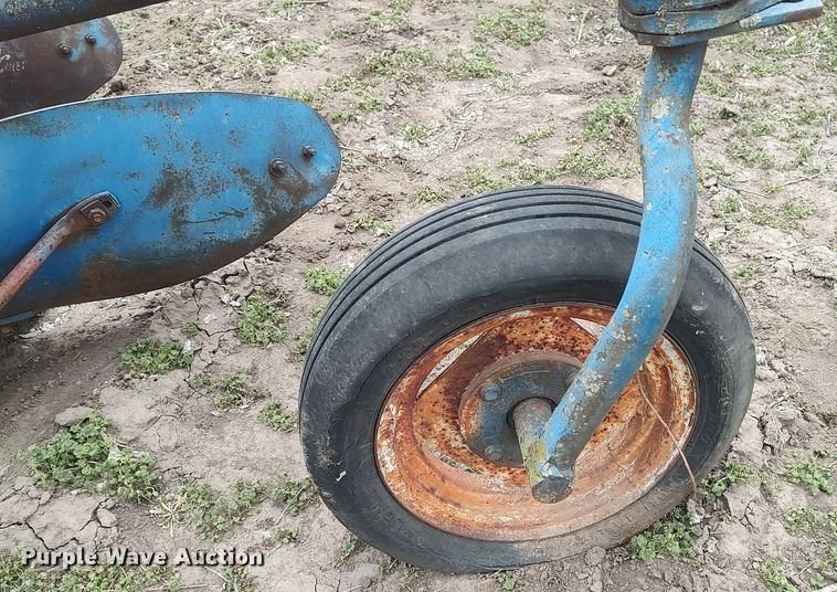 image for item DQ0375 McCormick  four bottom plow