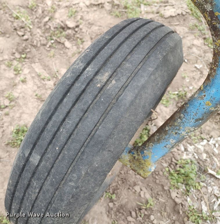 image for item DQ0375 McCormick  four bottom plow