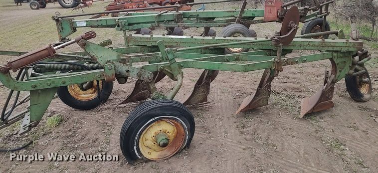 image for item DQ0384 John Deere  four bottom plow