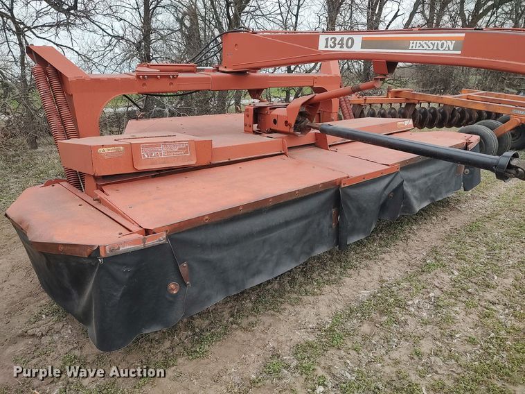 image for item DQ0389 1993 Hesston 1340  swather / windrower
