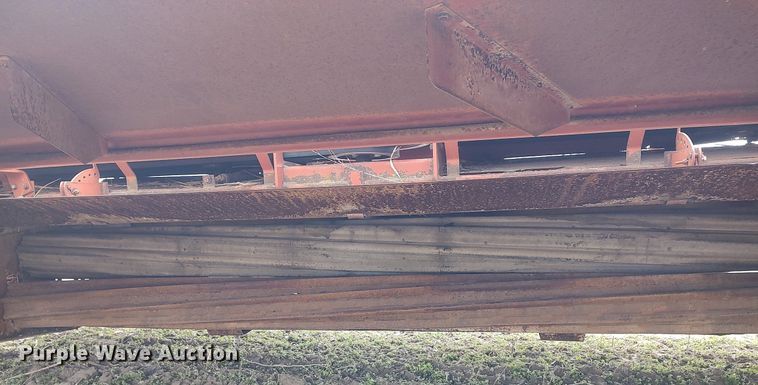 image for item DQ0389 1993 Hesston 1340  swather / windrower