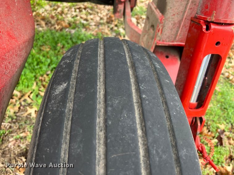 image for item KR9489 2008 New Holland 1409  swather / windrower