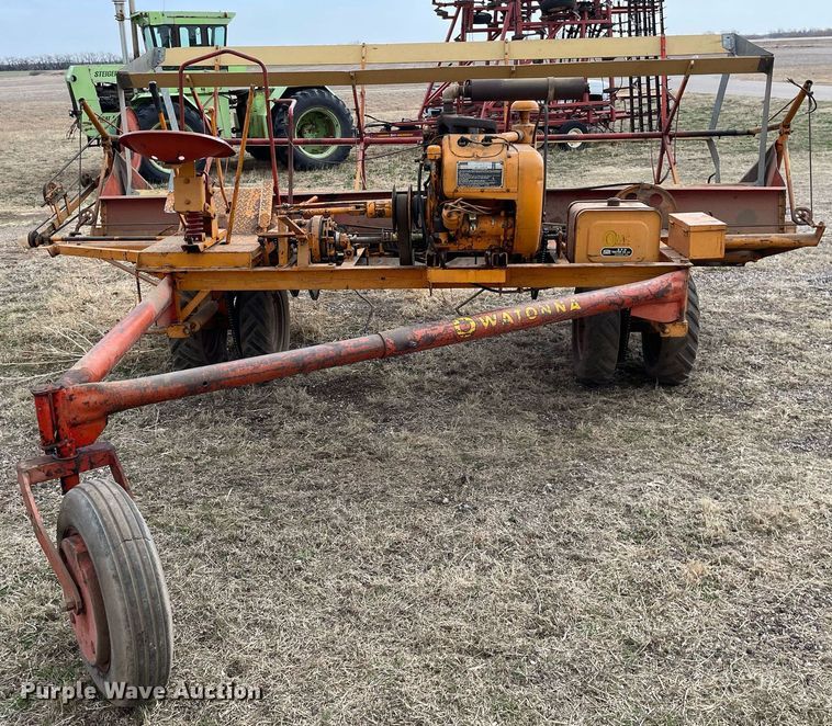 image for item MY9136 Owatonna 7D4  swather / windrower