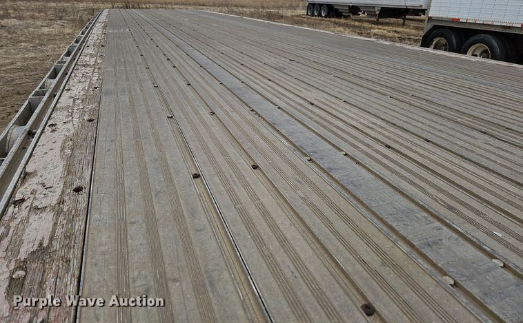 image for item DO4234 1999 Chaparral  flatbed trailer