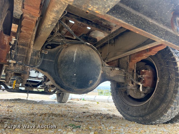 image for item MM9239 2002 Freightliner FL60  flatbed truck