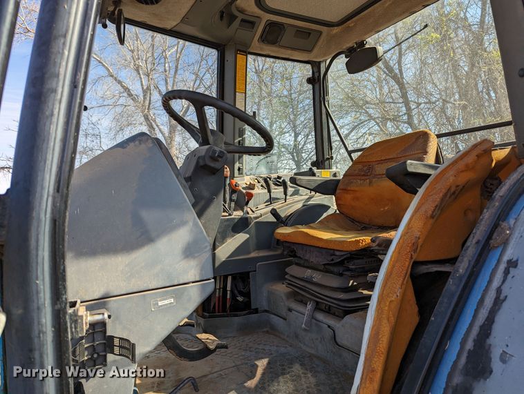 image for item MN9791 1994 Ford 8240  MFWD tractor