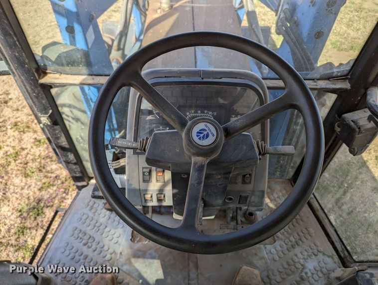 image for item MN9791 1994 Ford 8240  MFWD tractor