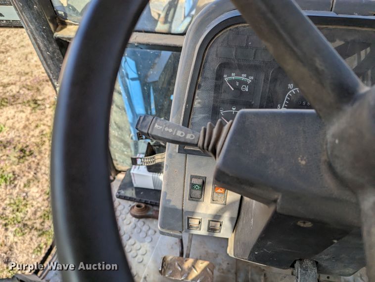 image for item MN9791 1994 Ford 8240  MFWD tractor