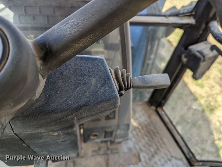 image for item MN9791 1994 Ford 8240  MFWD tractor