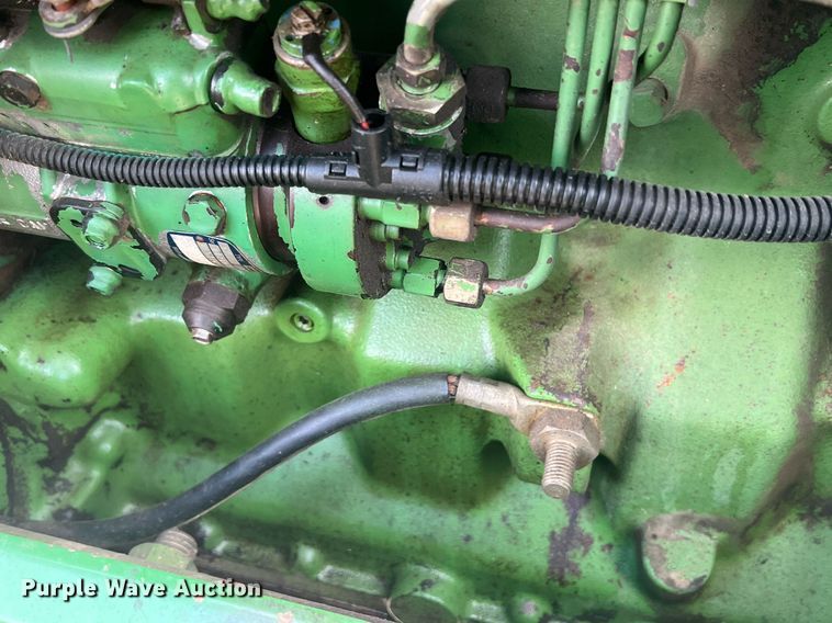 image for item MY9587 1994 John Deere 6300  MFWD tractor