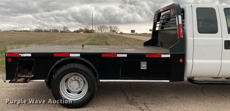 image for item DL7107 2012 Ford F550 Super Duty  SuperCab flatbed truck