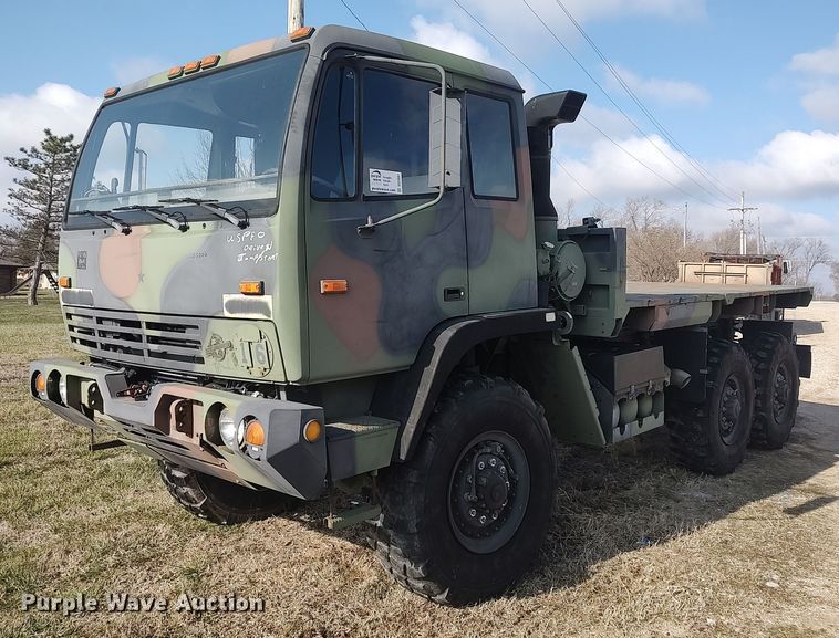 image for item DO3887 2002 Stewart & Stevenson M1083A1  flatbed truck