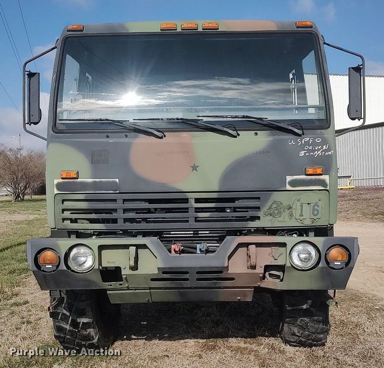 image for item DO3887 2002 Stewart & Stevenson M1083A1  flatbed truck