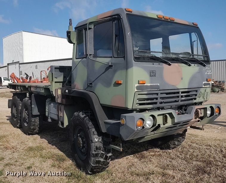 image for item DO3887 2002 Stewart & Stevenson M1083A1  flatbed truck