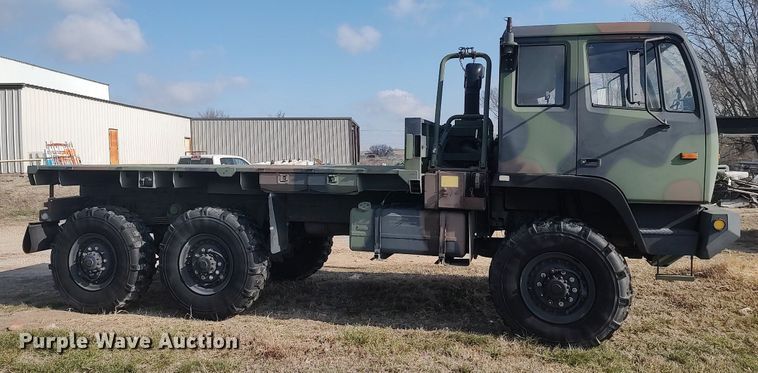 image for item DO3887 2002 Stewart & Stevenson M1083A1  flatbed truck