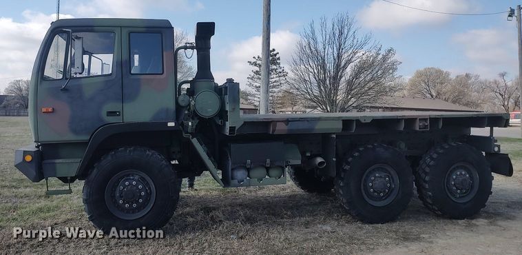 image for item DO3887 2002 Stewart & Stevenson M1083A1  flatbed truck