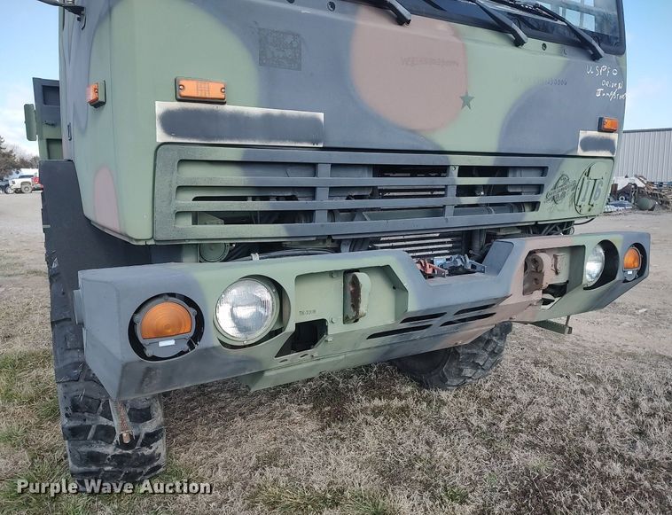 image for item DO3887 2002 Stewart & Stevenson M1083A1  flatbed truck