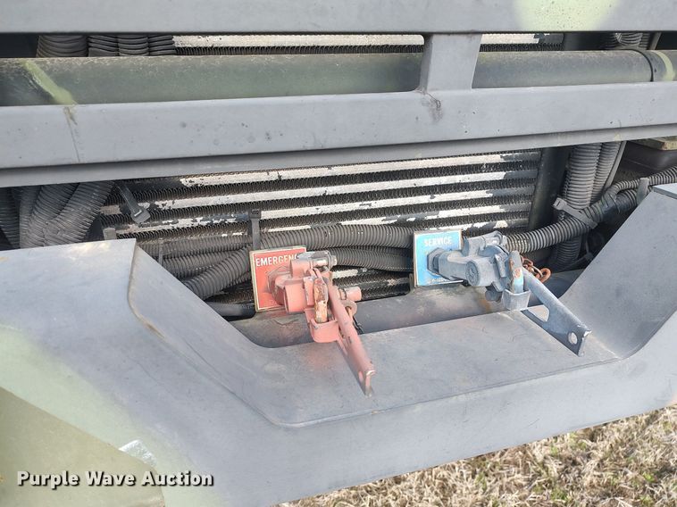 image for item DO3887 2002 Stewart & Stevenson M1083A1  flatbed truck