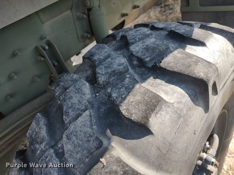 image for item DO3887 2002 Stewart & Stevenson M1083A1  flatbed truck