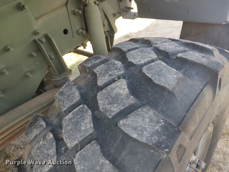 image for item DO3887 2002 Stewart & Stevenson M1083A1  flatbed truck