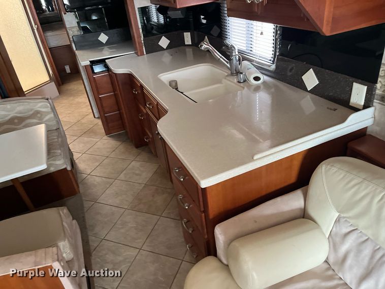 image for item DQ4104 2004 Fleetwood Revolution  RV