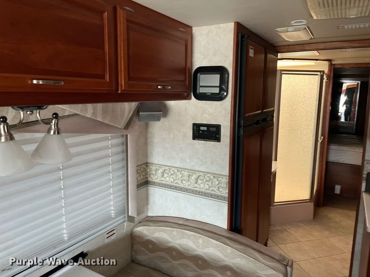 image for item DQ4104 2004 Fleetwood Revolution  RV