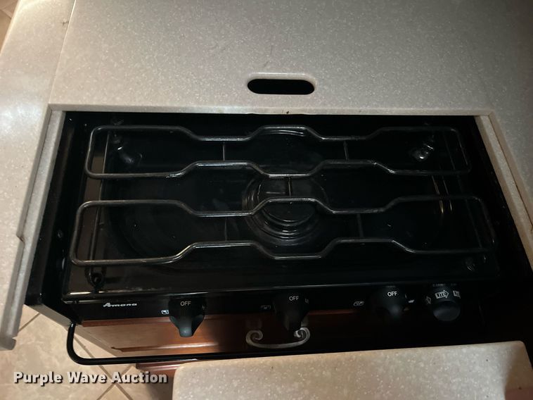 image for item DQ4104 2004 Fleetwood Revolution  RV