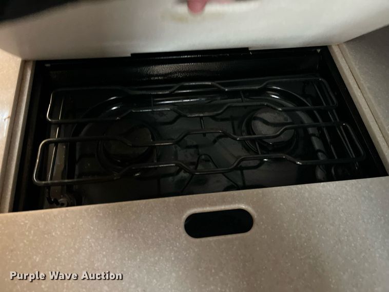 image for item DQ4104 2004 Fleetwood Revolution  RV