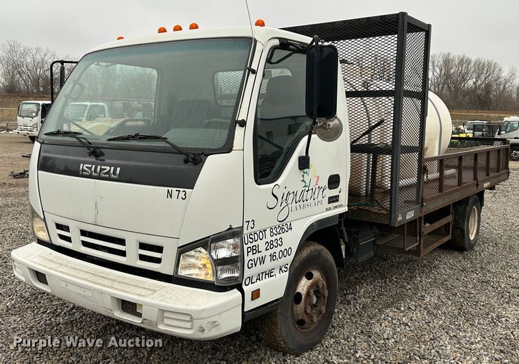 image for item DR5069 2007 Isuzu NPR  flatbed truck
