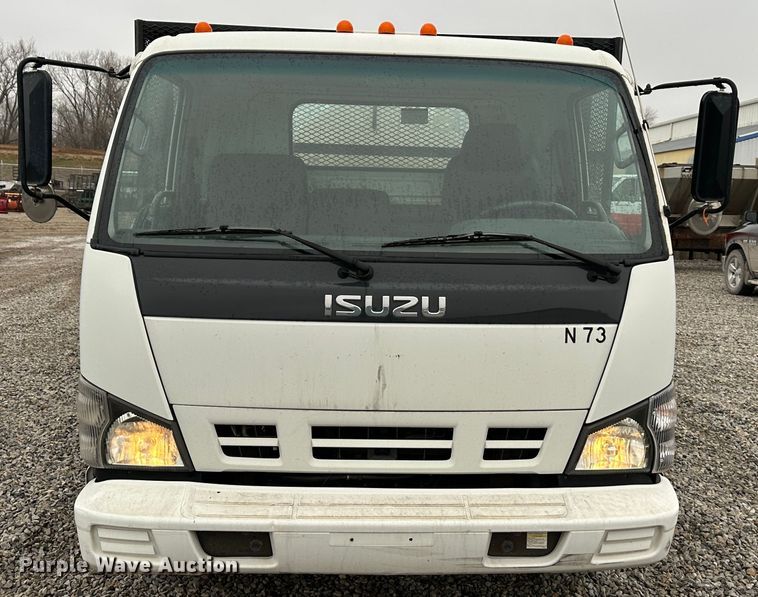 image for item DR5069 2007 Isuzu NPR  flatbed truck
