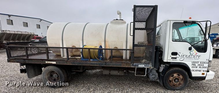 image for item DR5069 2007 Isuzu NPR  flatbed truck