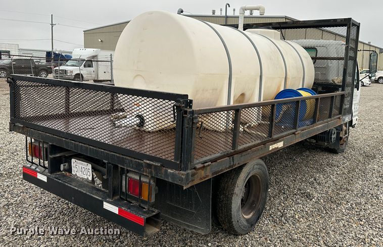 image for item DR5069 2007 Isuzu NPR  flatbed truck