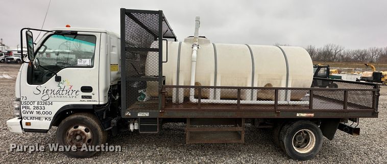 image for item DR5069 2007 Isuzu NPR  flatbed truck