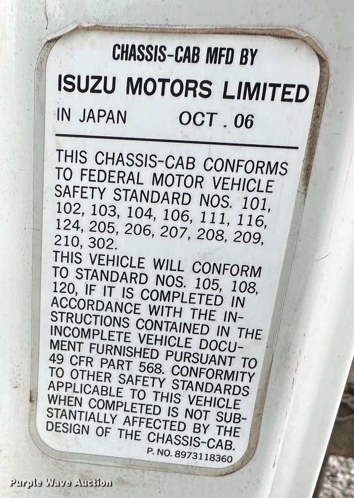 image for item DR5069 2007 Isuzu NPR  flatbed truck