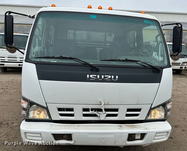 image for item DR5075 2007 Isuzu NPR  flatbed truck
