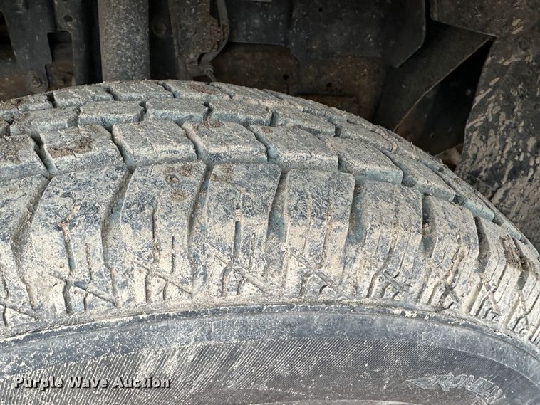 image for item DR5076 2012 Isuzu NPR  flatbed truck