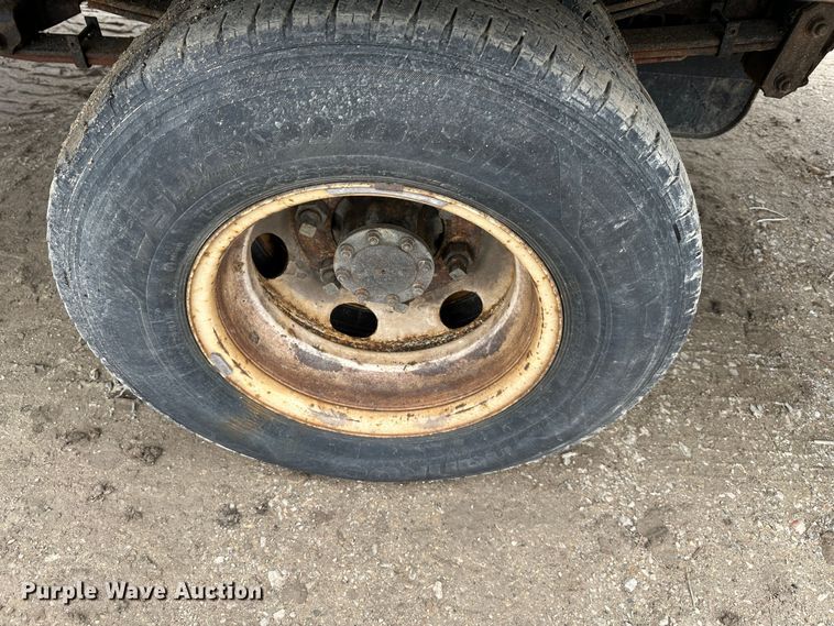 image for item DR5076 2012 Isuzu NPR  flatbed truck