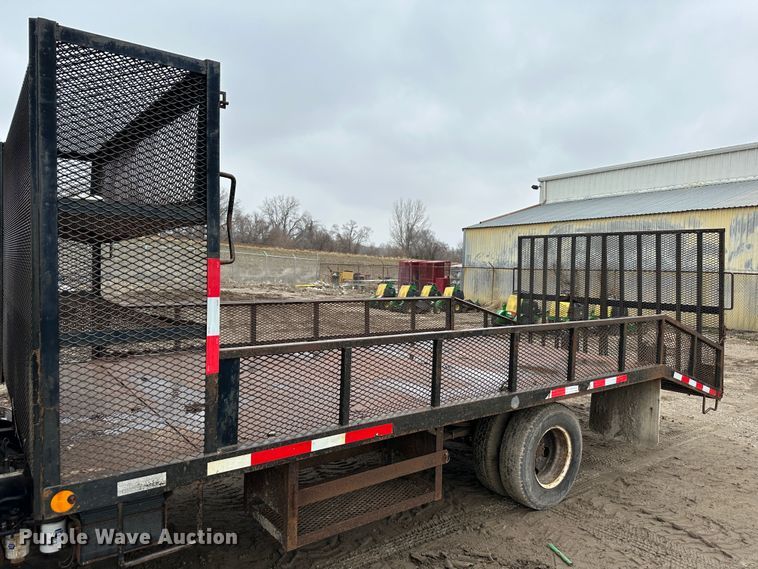 image for item DR5077 2005 Isuzu NPR  flatbed truck