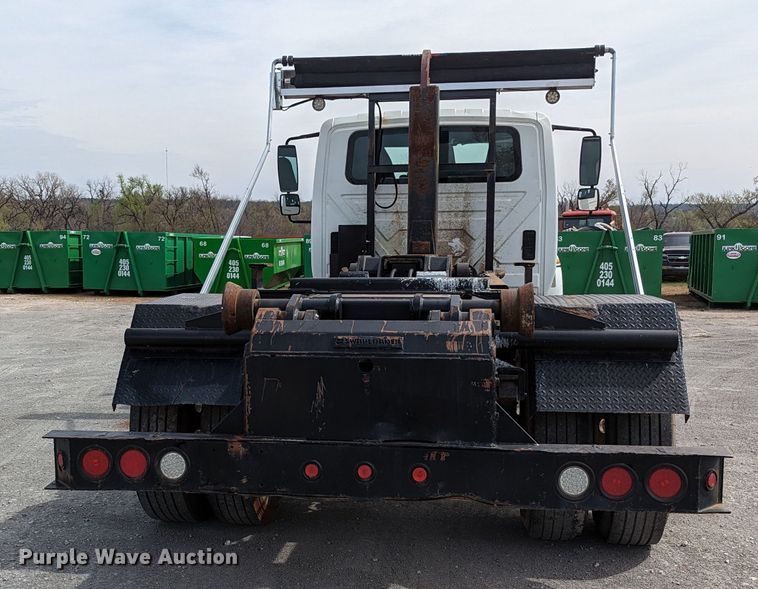 image for item MN9835 2003 International 4300  roll-off container truck