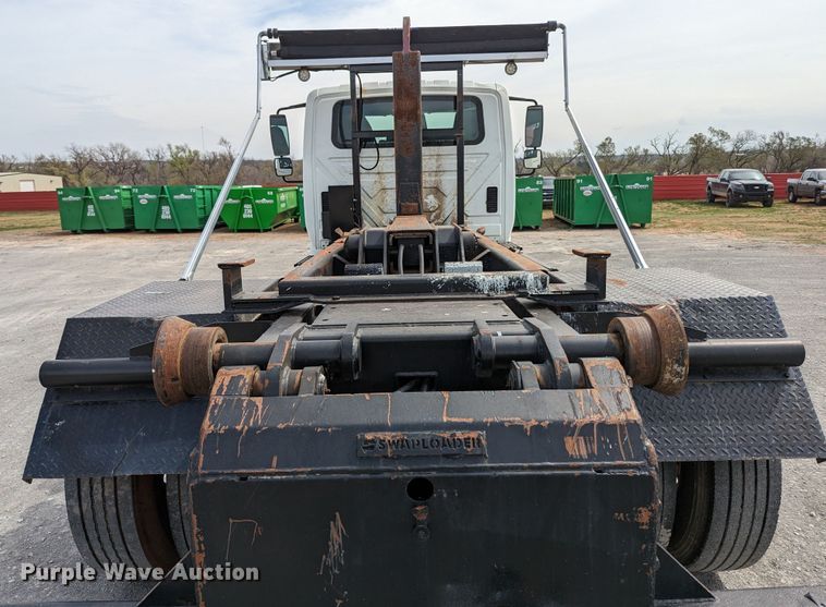 image for item MN9835 2003 International 4300  roll-off container truck