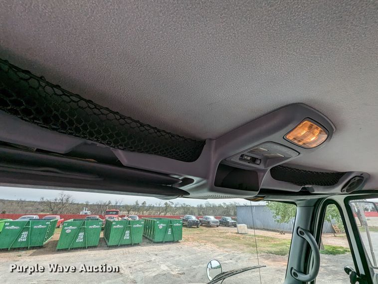 image for item MN9835 2003 International 4300  roll-off container truck