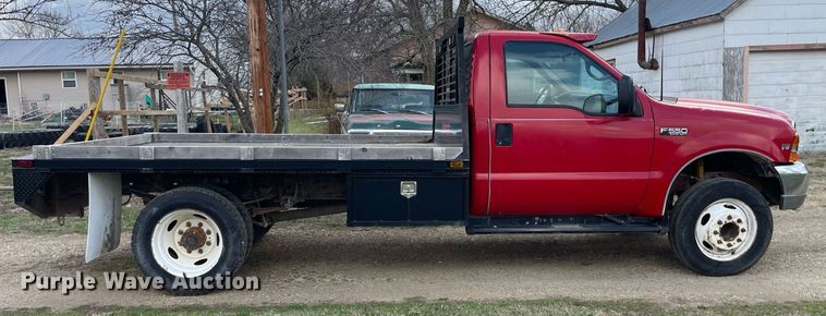 image for item MY9232 1999 Ford F550 Super Duty  flatbed truck