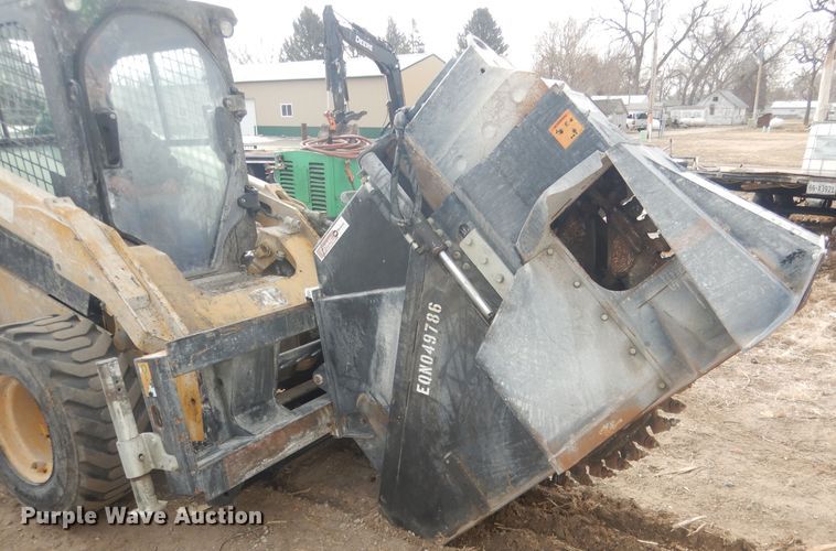 image for item DJ7017 Caterpillar SW345B-80  skid steer rock saw