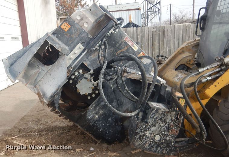 image for item DJ7017 Caterpillar SW345B-80  skid steer rock saw